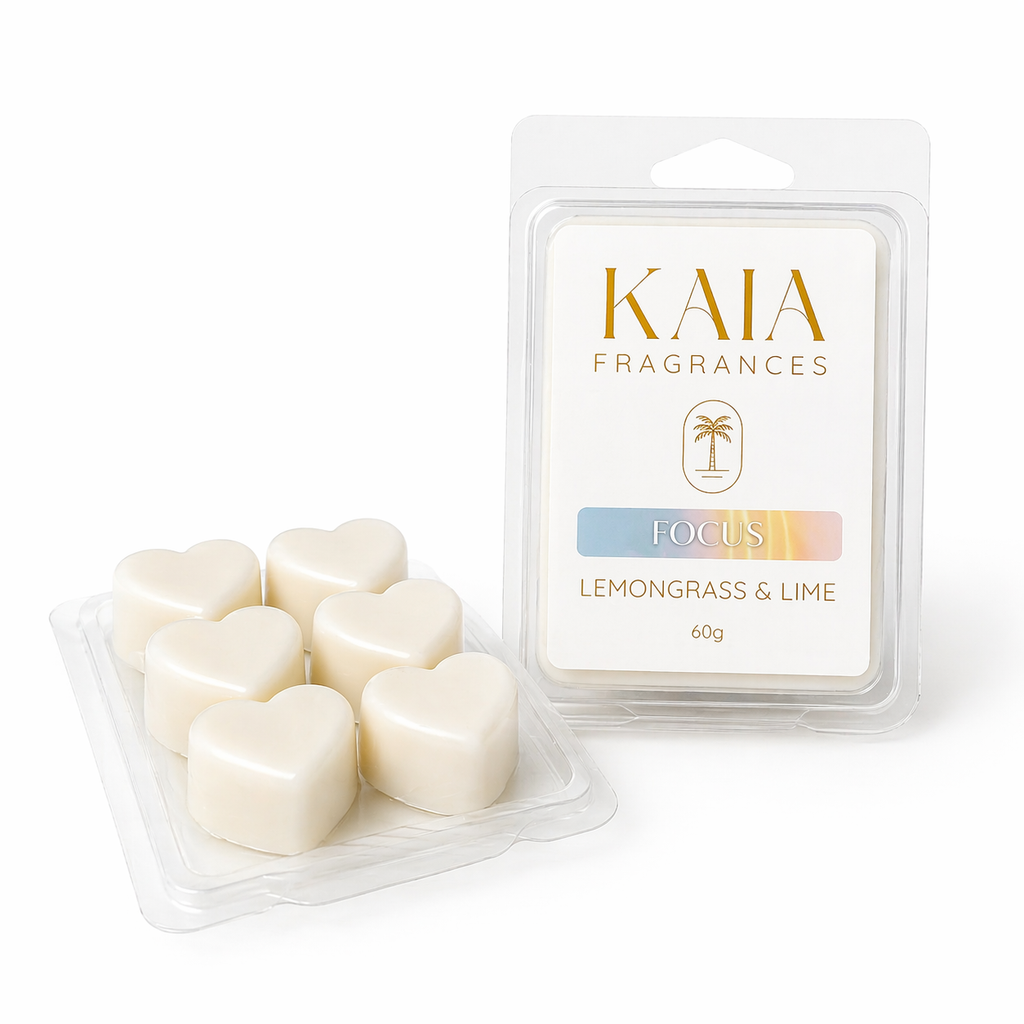 Heart-shaped wax melts in a clear container with 'KAIA Fragrances' packaging on a white background.