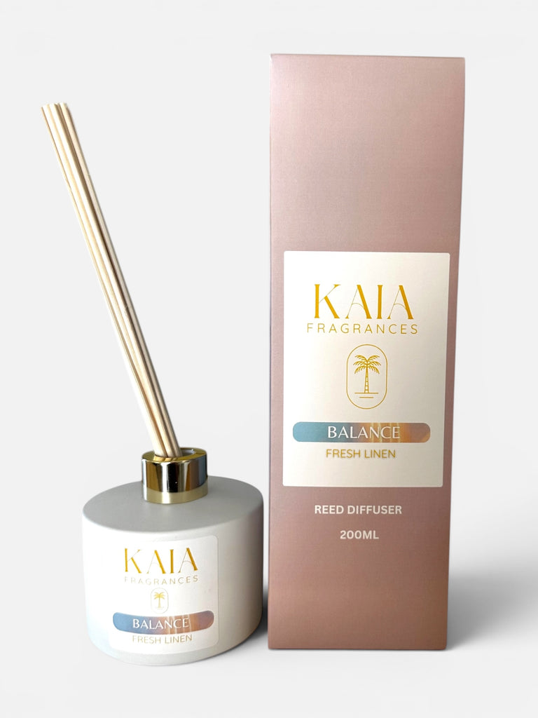Reed diffuser with packaging labeled 'KAIA Fragrances' on a white background