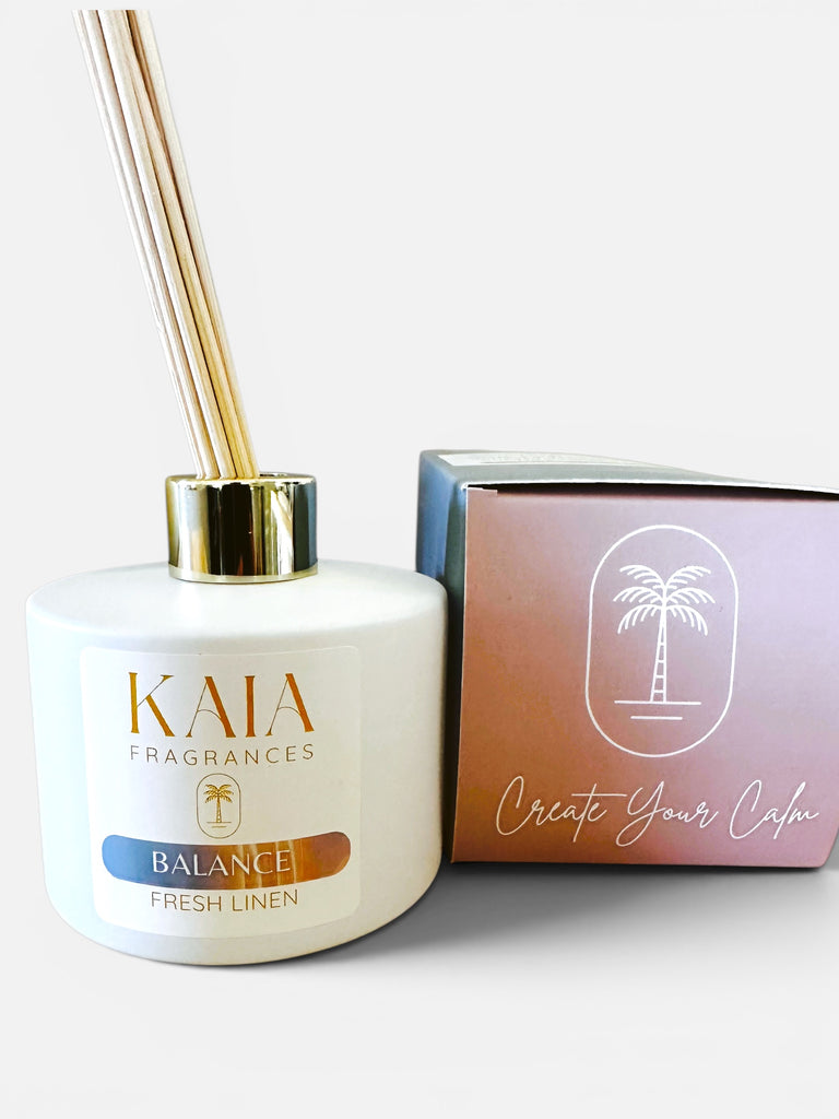 KAIA Fragrances diffuser with packaging on a white background