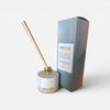 KAIA Reed diffuser with natural sticks and packaging on a white background