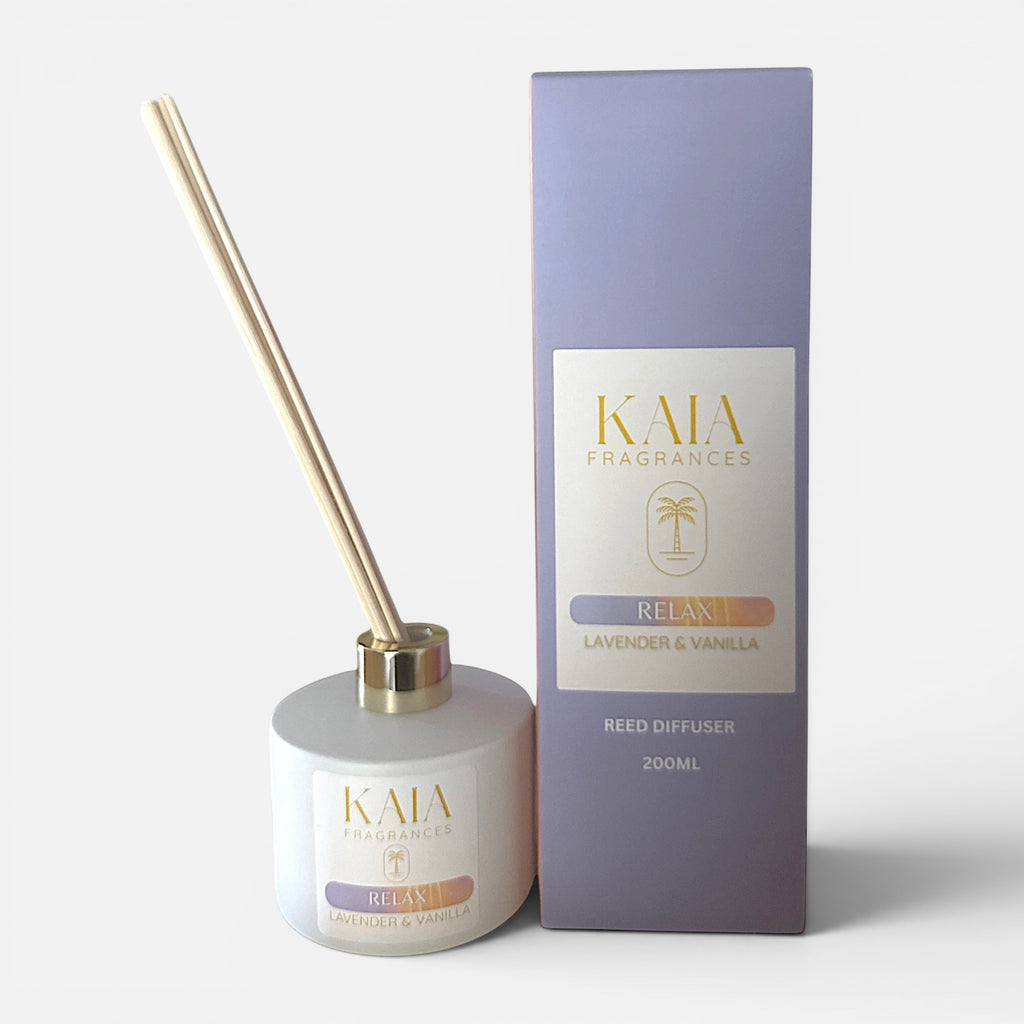 KAIA Fragrances lavender and vanilla reed diffuser with packaging on a white background