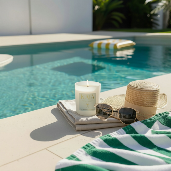KAIA Summer Daze Candle with pool in background 