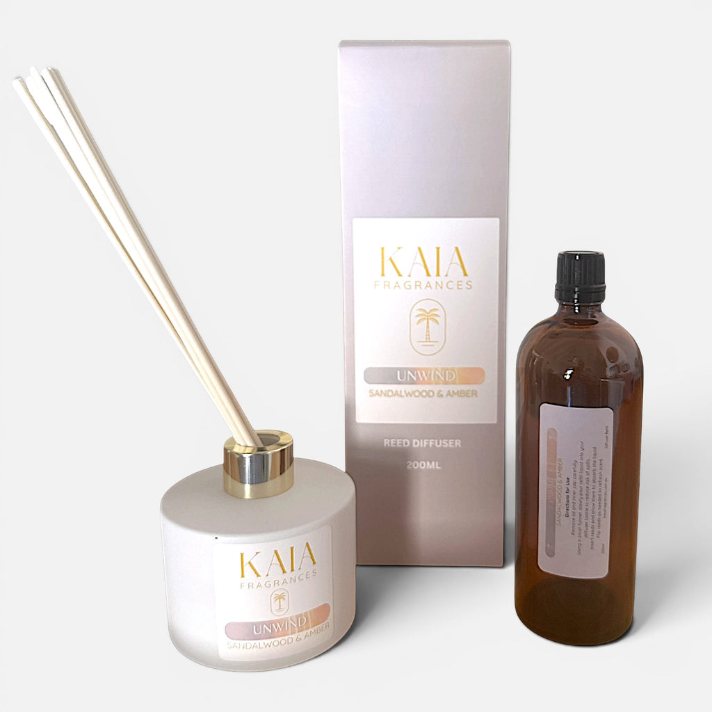KAIA Fragrances diffuser set with reeds, container, and refill bottle on a white background