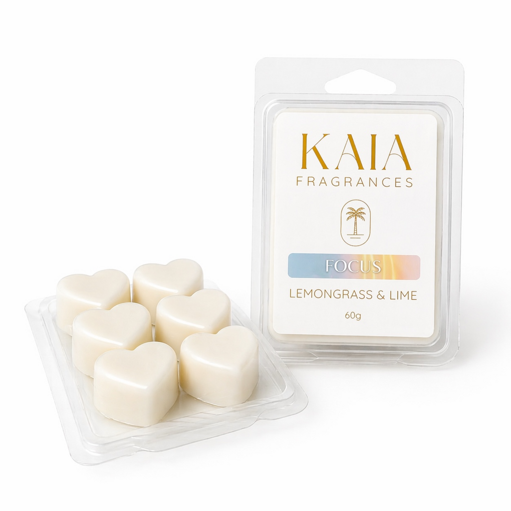 Heart-shaped wax melts in a clear container with 'KAIA Fragrances' packaging on a white background.