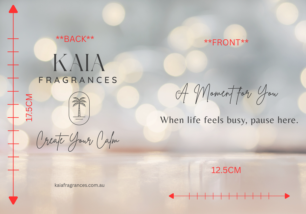 KAIA Fragrances Greeting Card with measurement details and blurred lights in the background